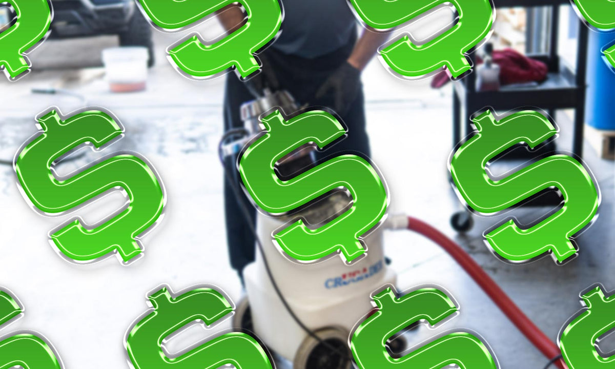A picture of a vacuum with green dollar signs over the image