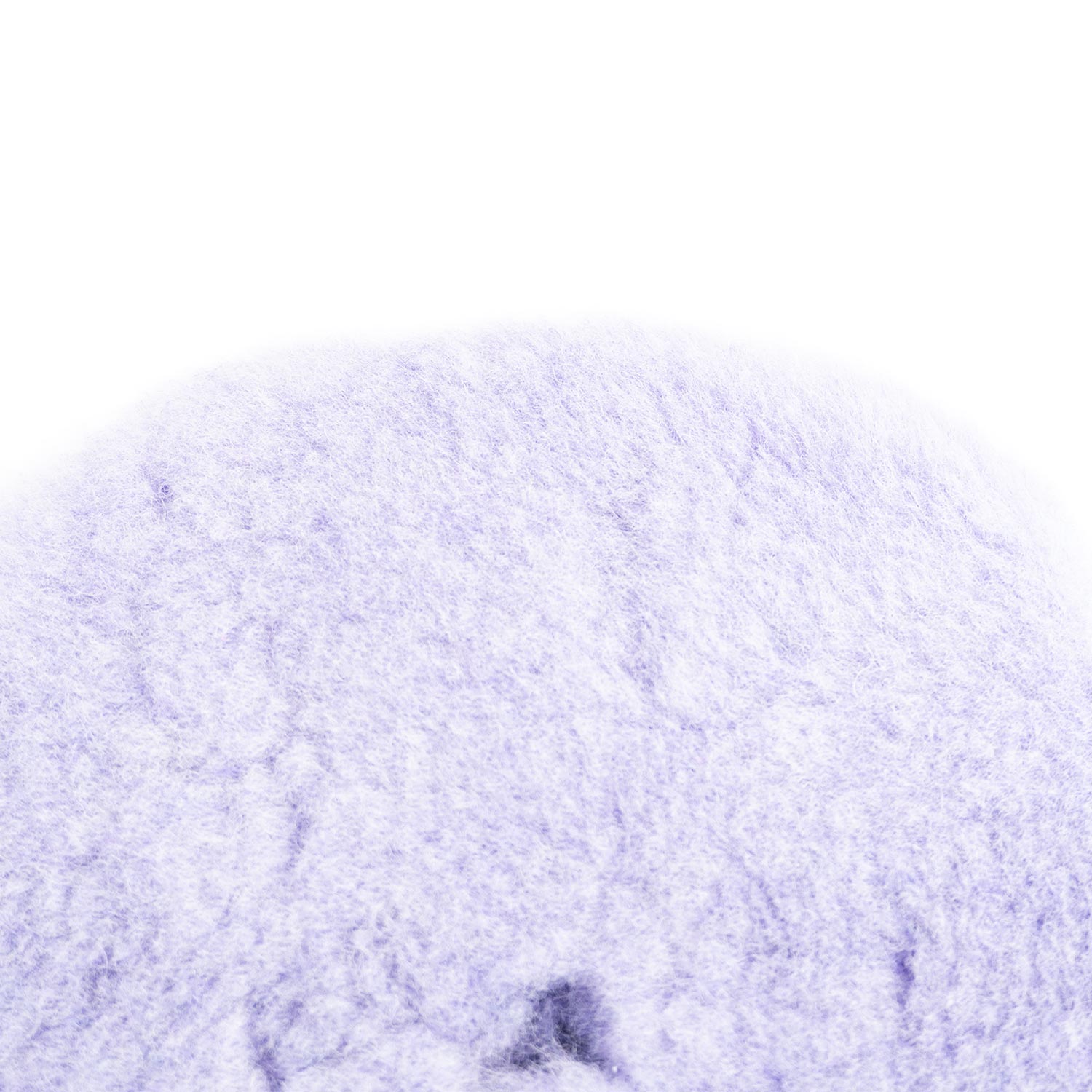 Close-up of light purple wool pad on a white background