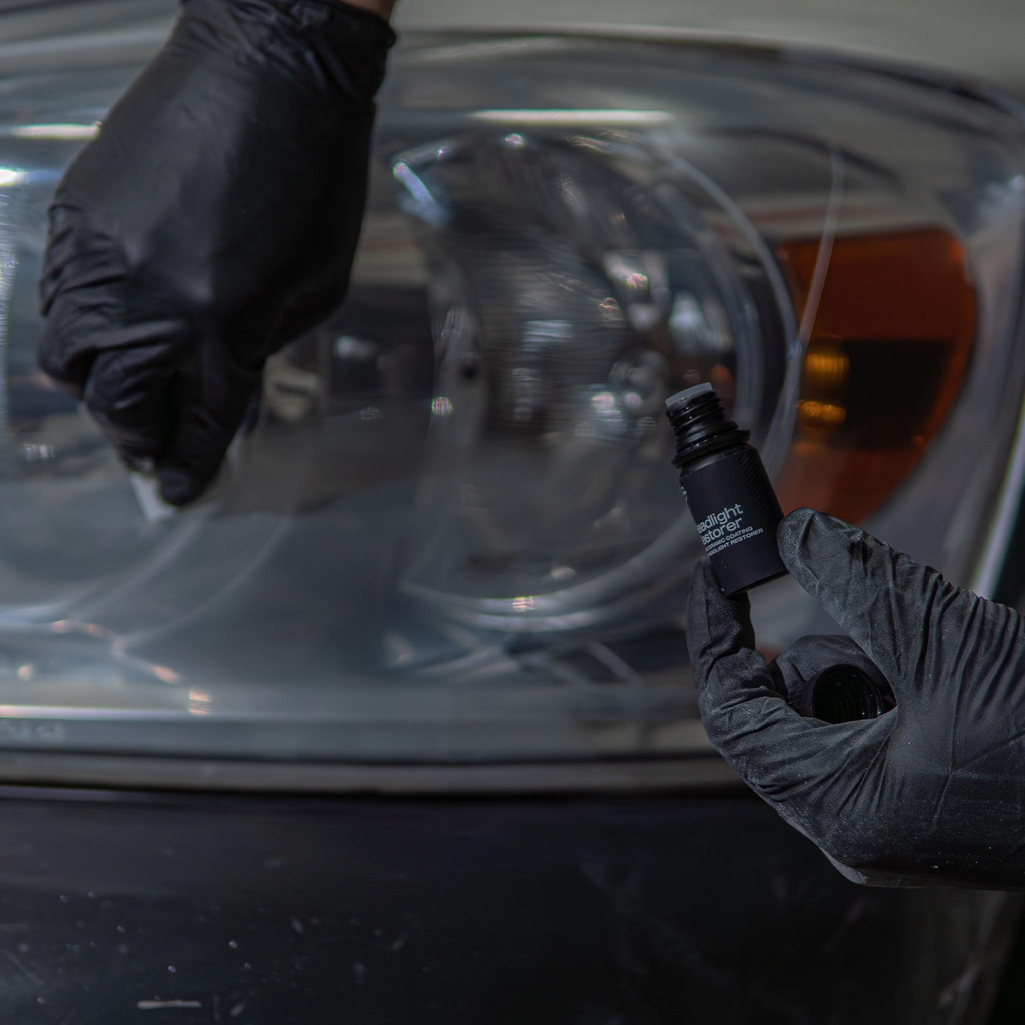 headlight restorer bottle with application in the background