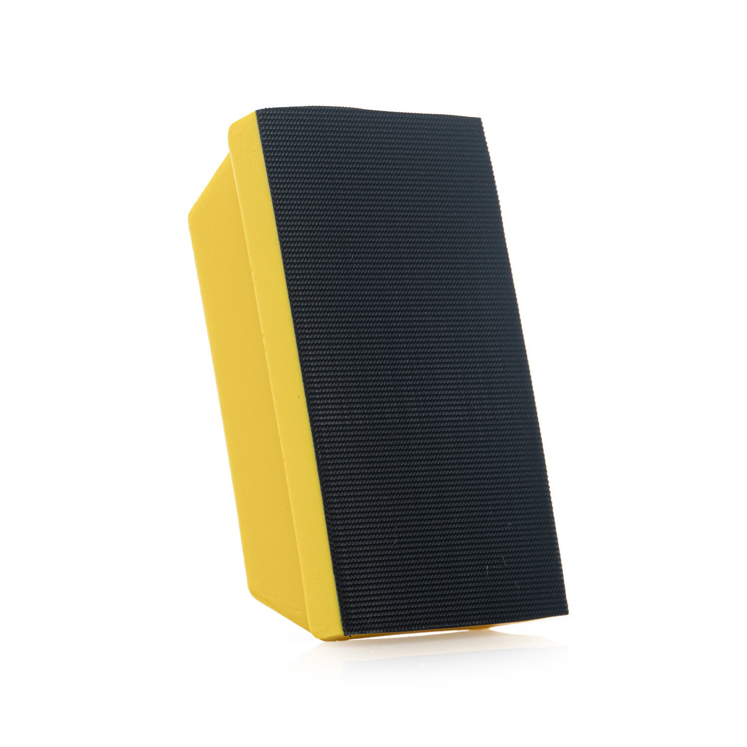 Velcro side of foam sanding block on a white background