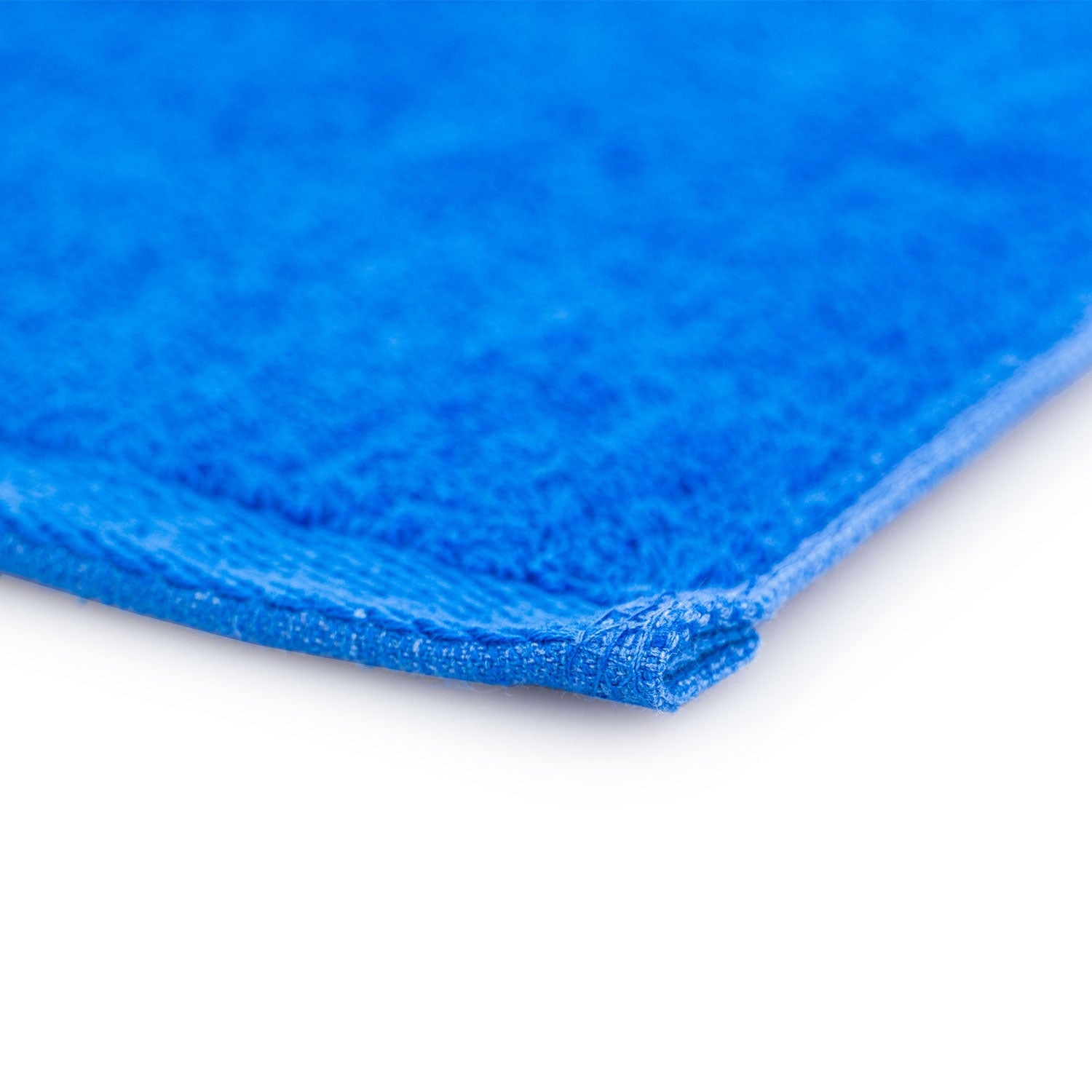Close-up of a blue textured towel on a white background