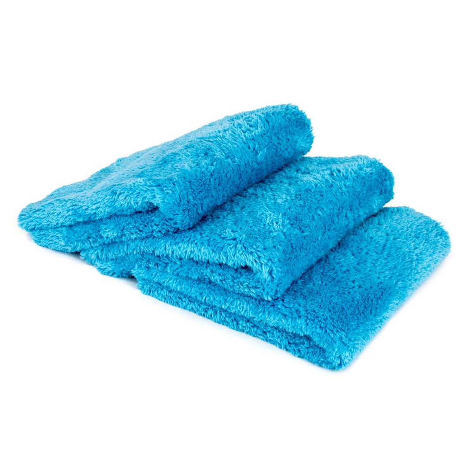 Set of three blue towels on a white background