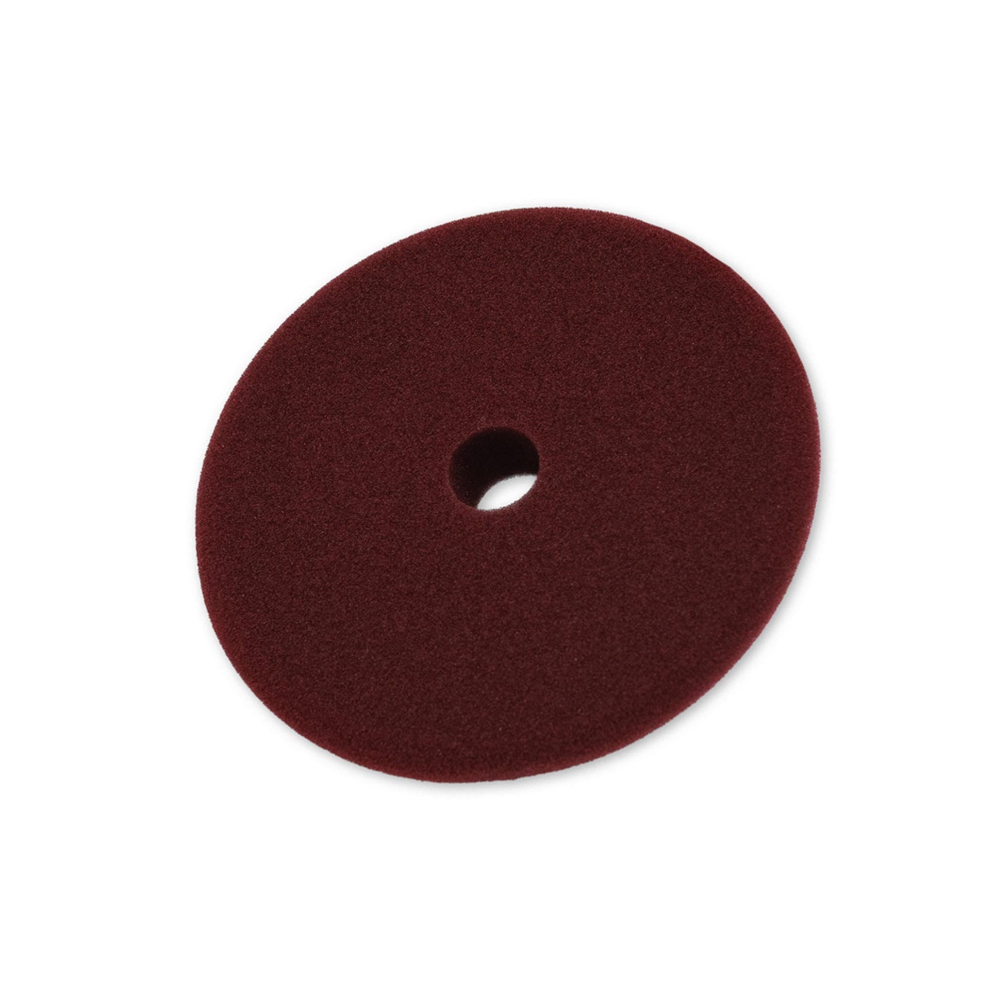 Maroon Foam buffing pad on a white background
