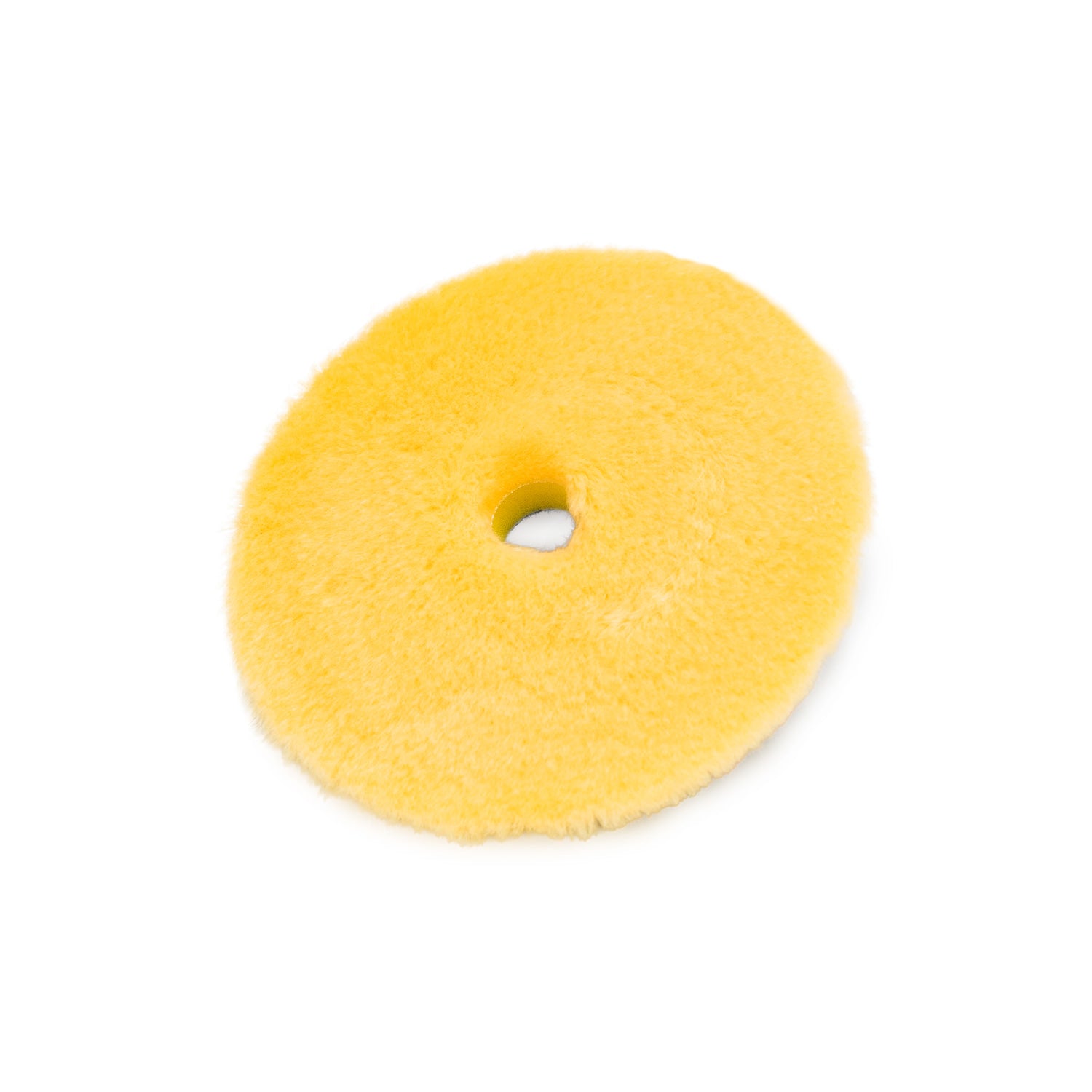 Yellow wool pad on a white background
