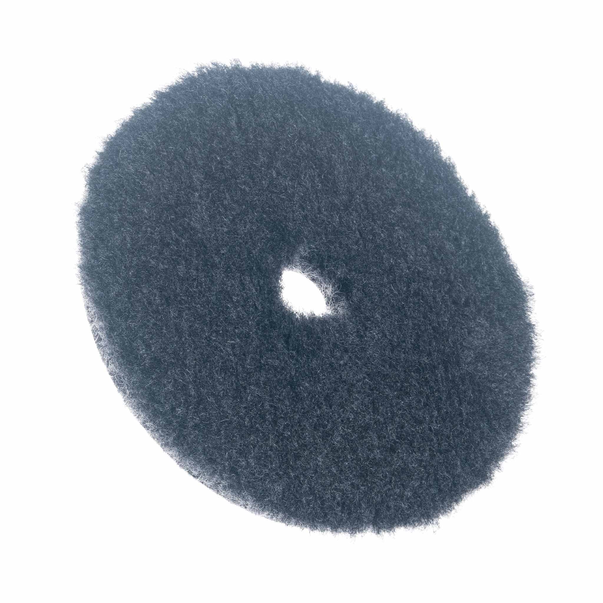 Round 5" grey wool pad on a white background