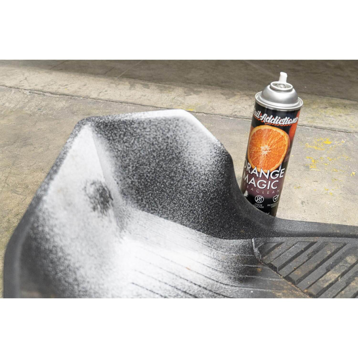 foamy cleaner on floor mat
