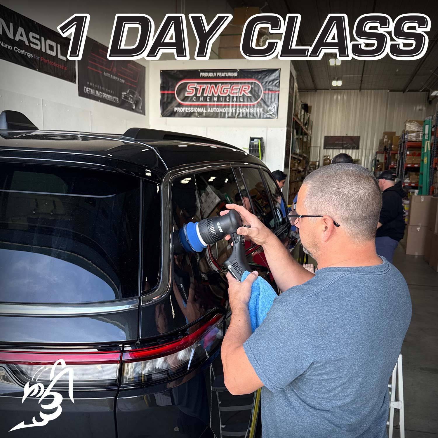 Person cleaning a car window framewith a polisher in a workshop setting, with 'Stinger' branding visible.