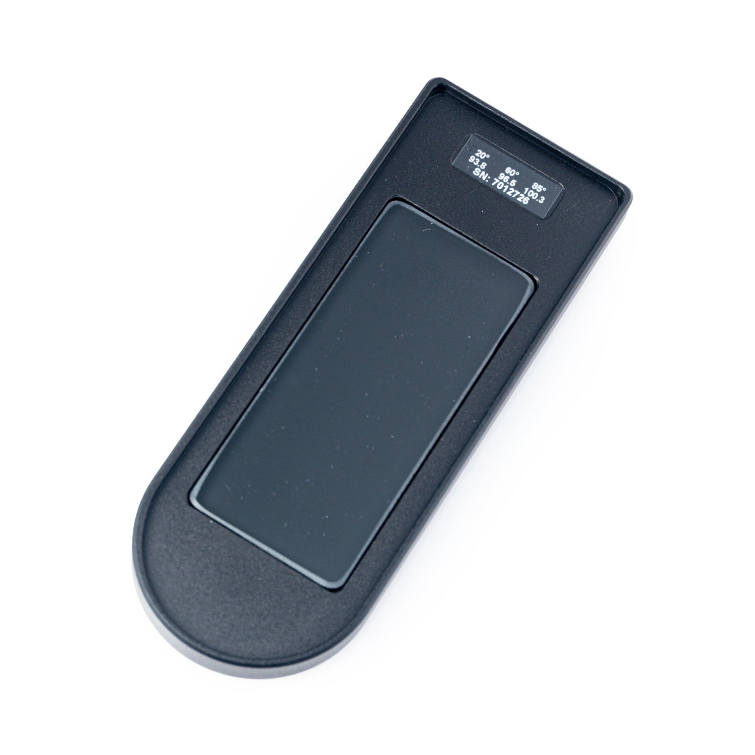 Black detailometer calibration plate on a white background