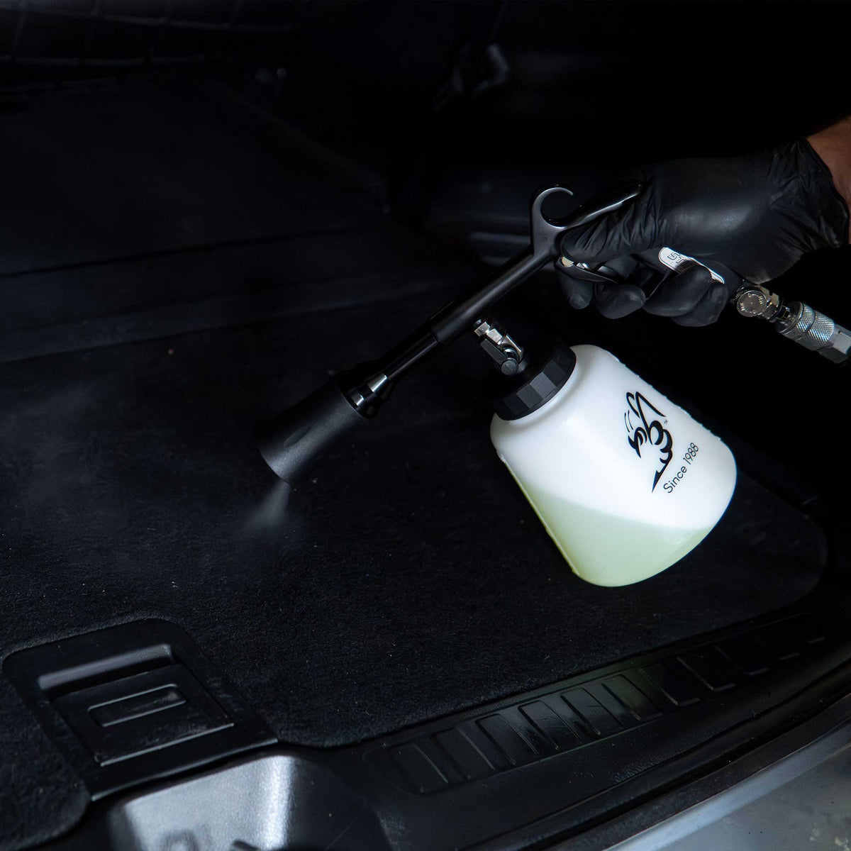 Stinger Twister Complete tool deep cleaning trunk carpet with air and cleaning solution