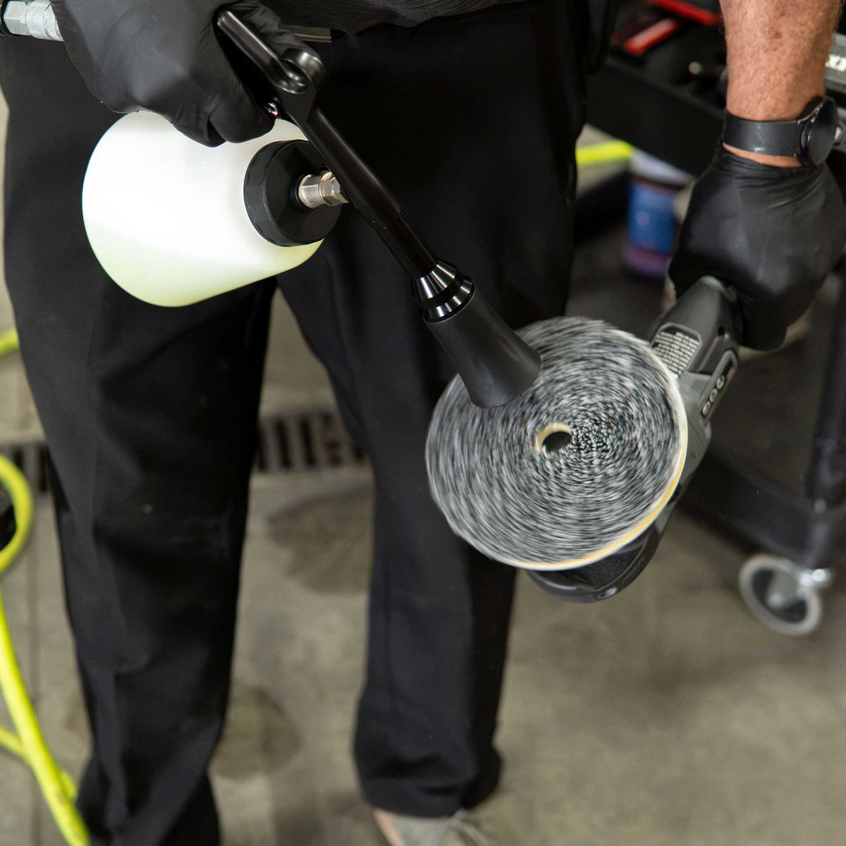 Stinger Twister Complete tool cleaning a wool polishing pad on a dual action polisher