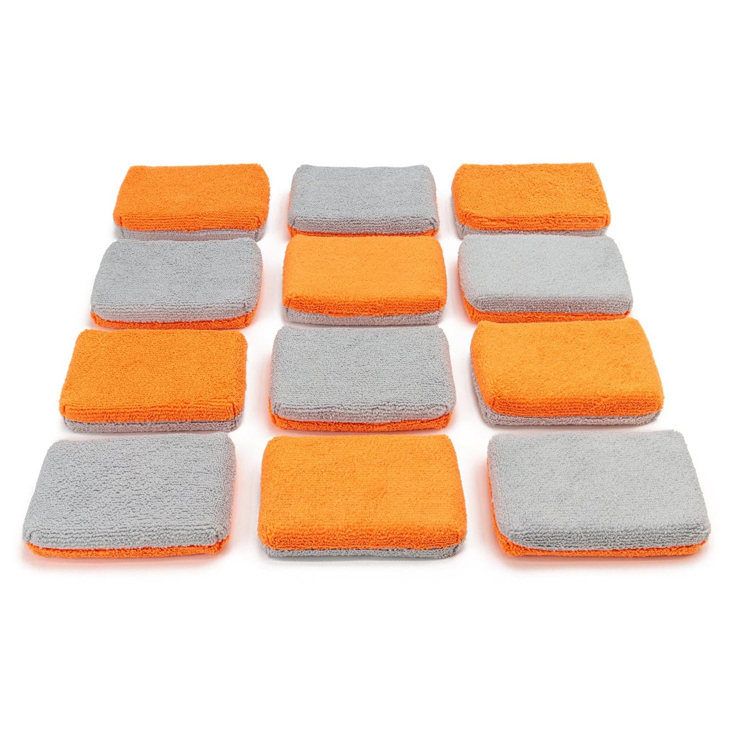 Set of 12 orange and gray rectangle thin applicators on a white background
