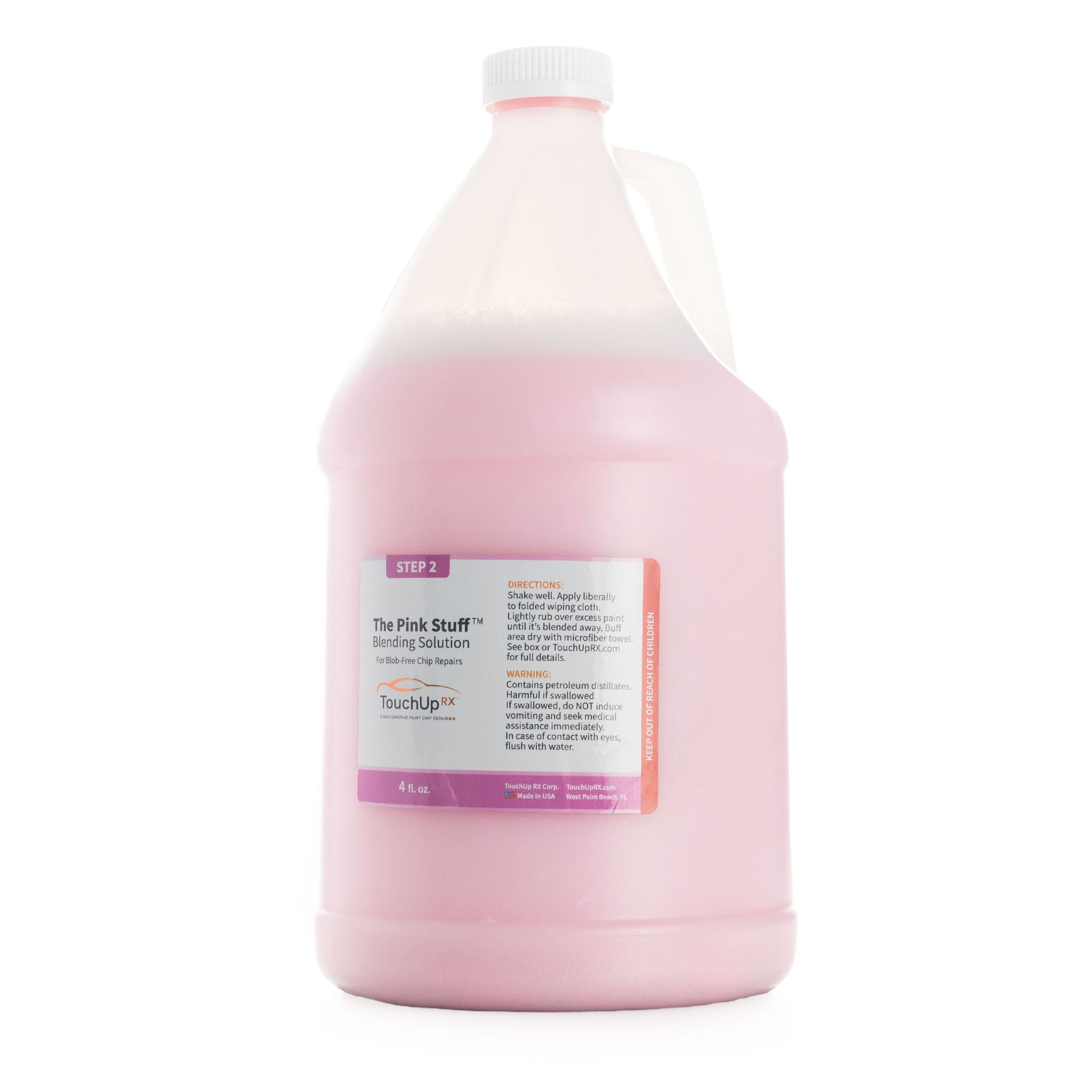 Large gallon bottle labeled 'The Pink Stuff' on a white background