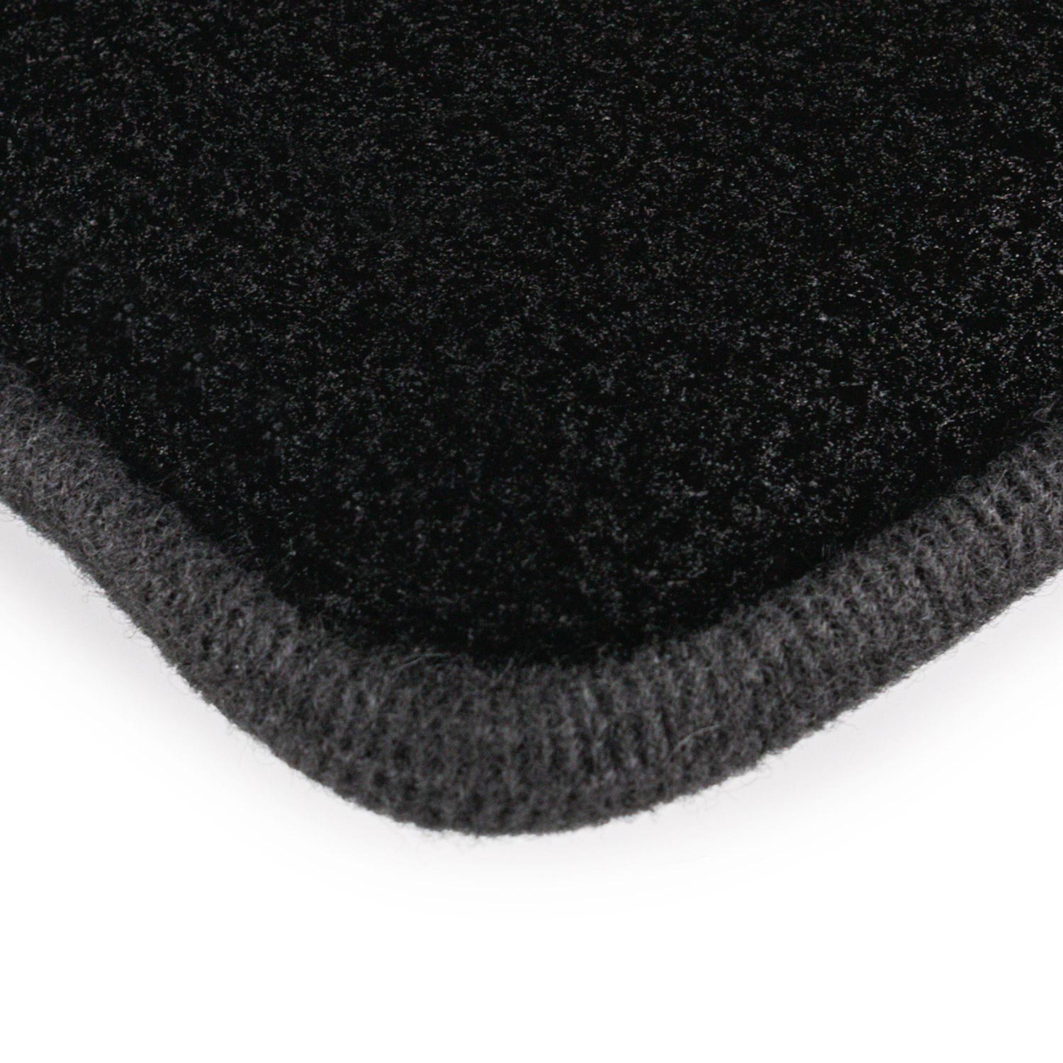 Close-up of a black interior scrubber on a white background