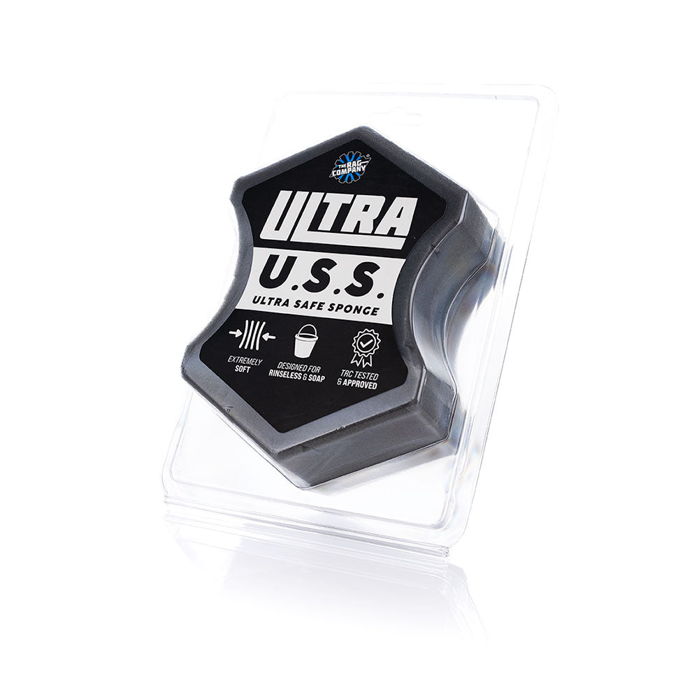 Hexagonal ultra soft sponge in clear packaging with branding on a white background