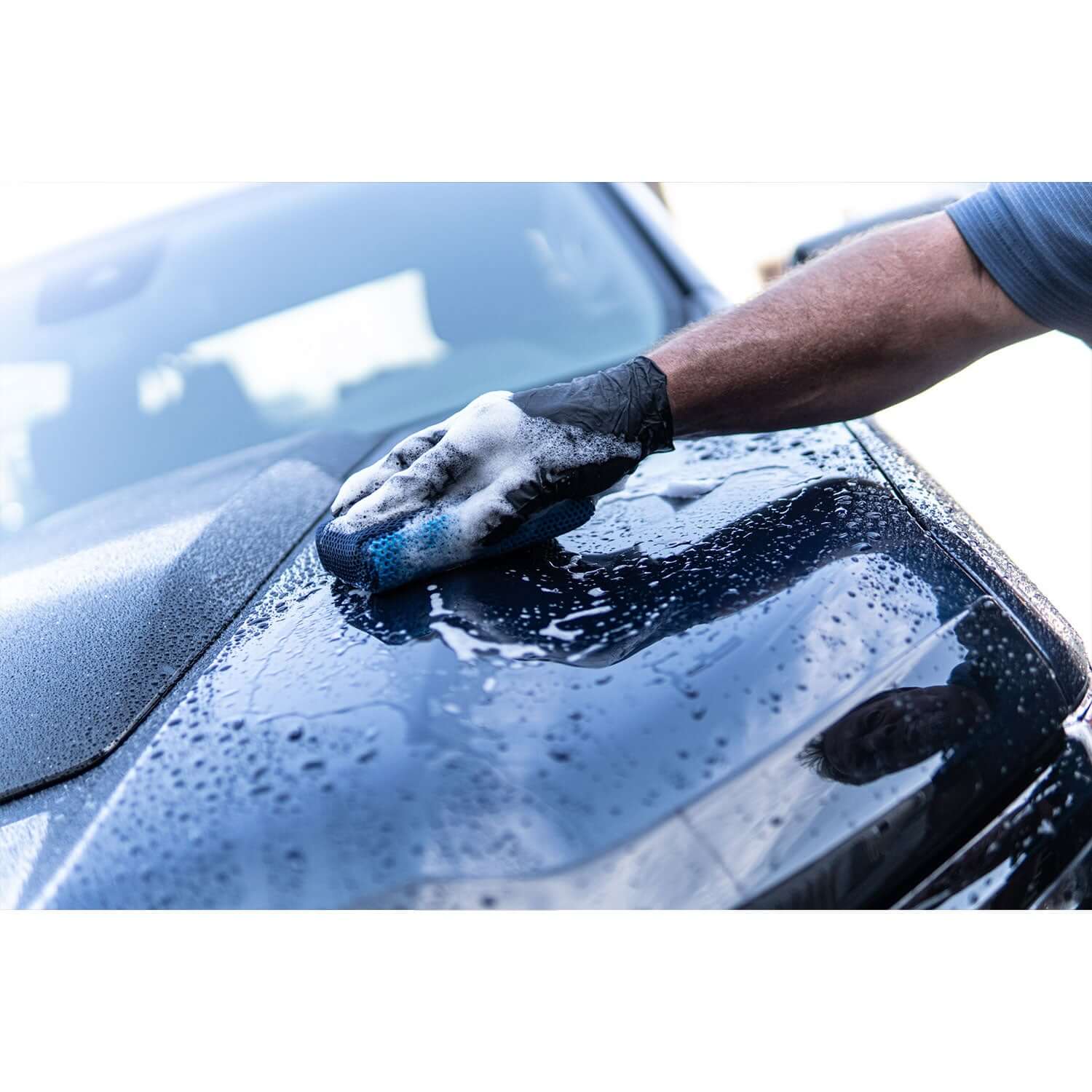clay scrubber on car