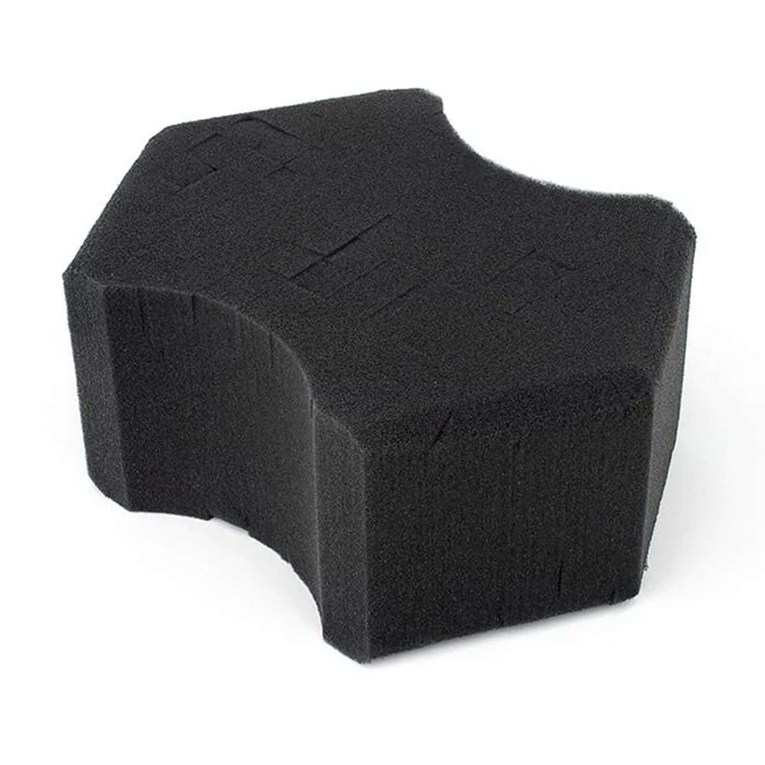 ultra black sponge with cut interior on a white background