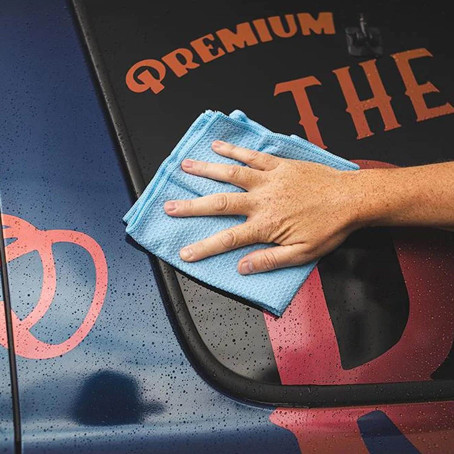 light blue waffle drying towel on vehicle
