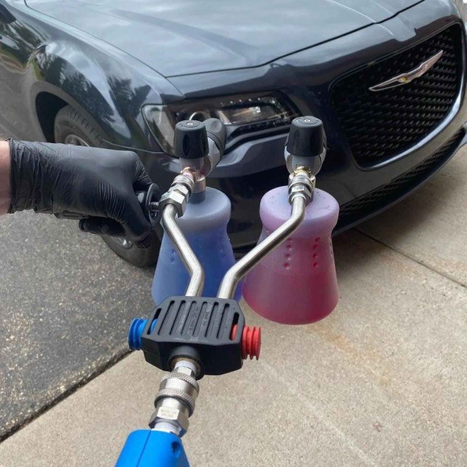Toro Edition MEzzo Valve for Pressure Washers with two foam cannons attached in front of a car