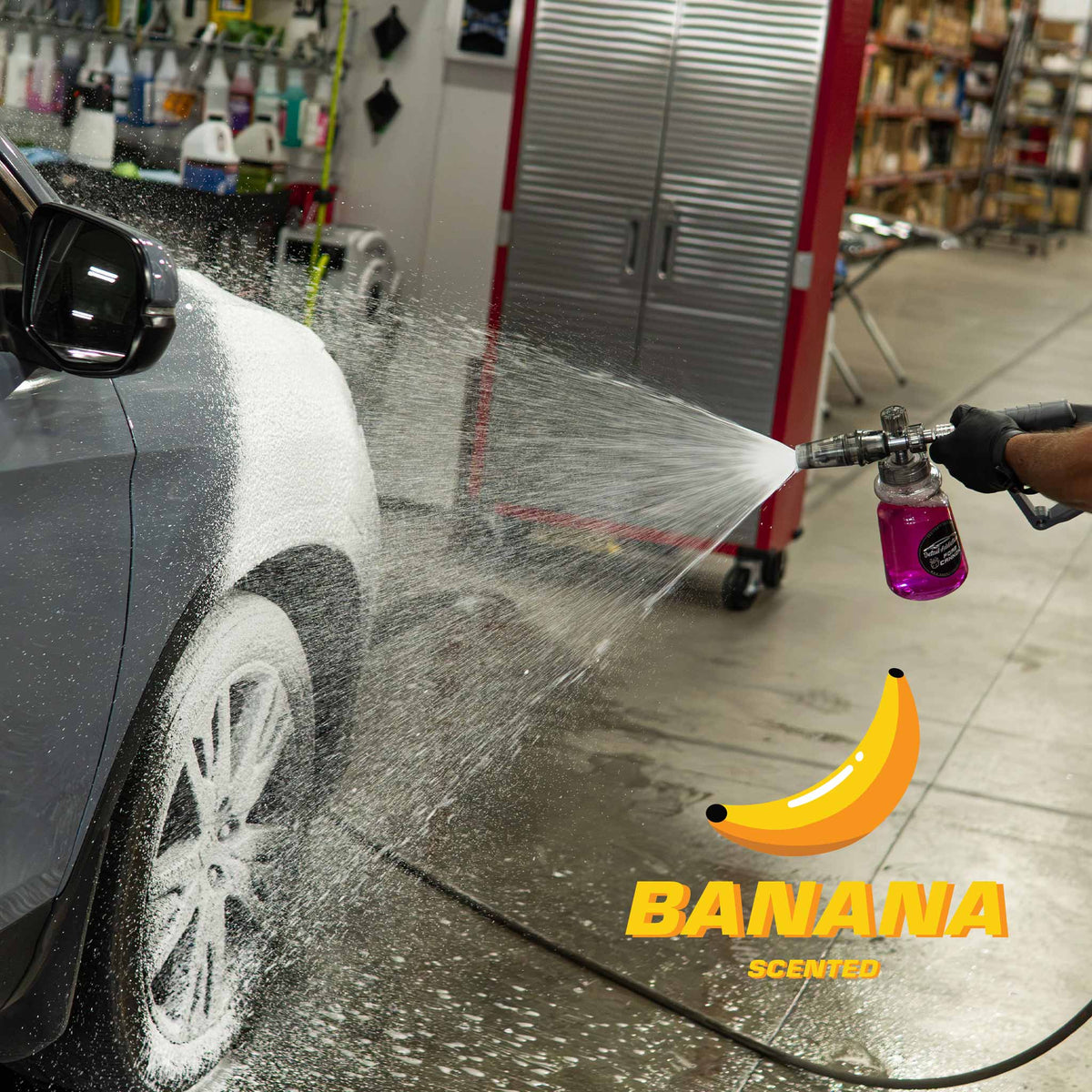 Stinger Chemical Bubblicious 704 banana scented car wash soap foaming a car in a detail bay