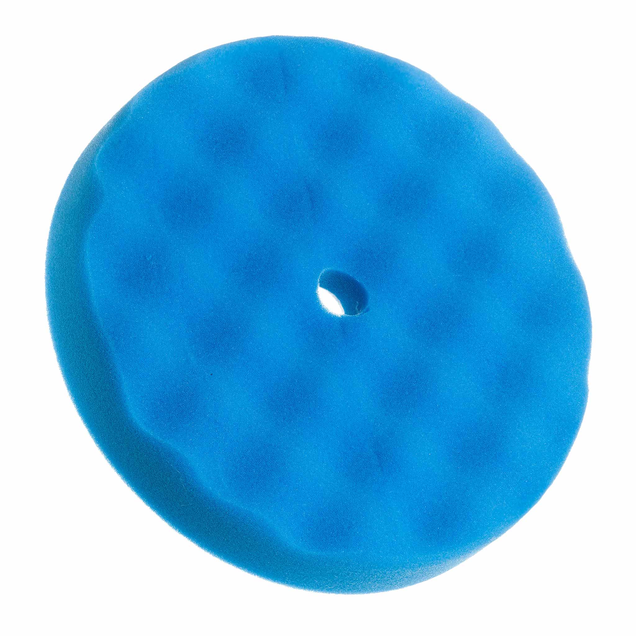 Blue circular waffle pad with a center hole on a white background