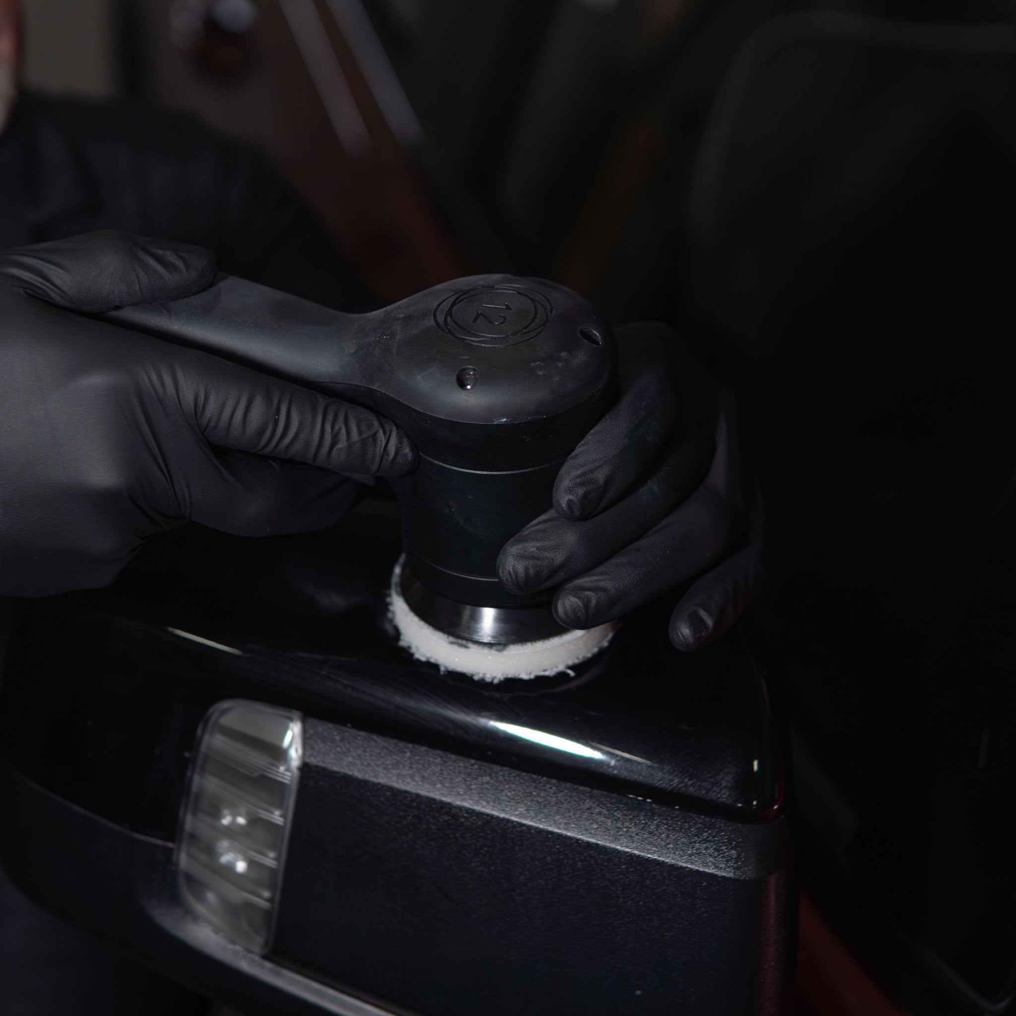 3 inch buffer with 392mfp pad polishing on a truck mirror