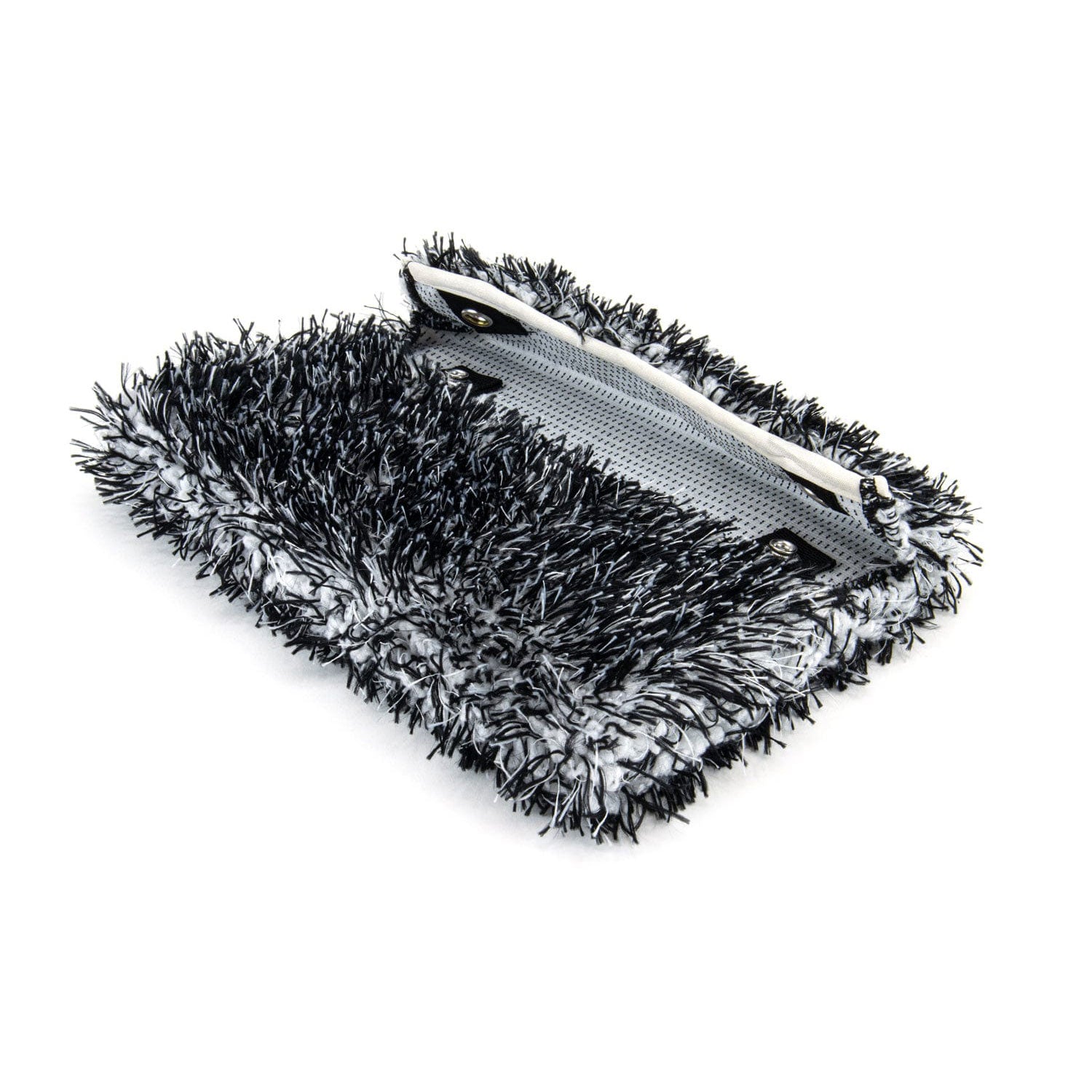 Microfiber cleaning pad with bristle edge on a white background