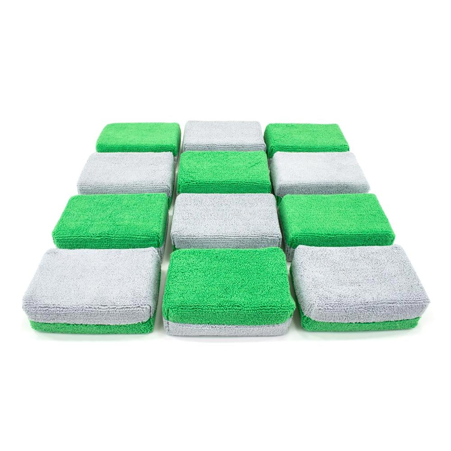 Set of green and gray microfiber applicators on a white background