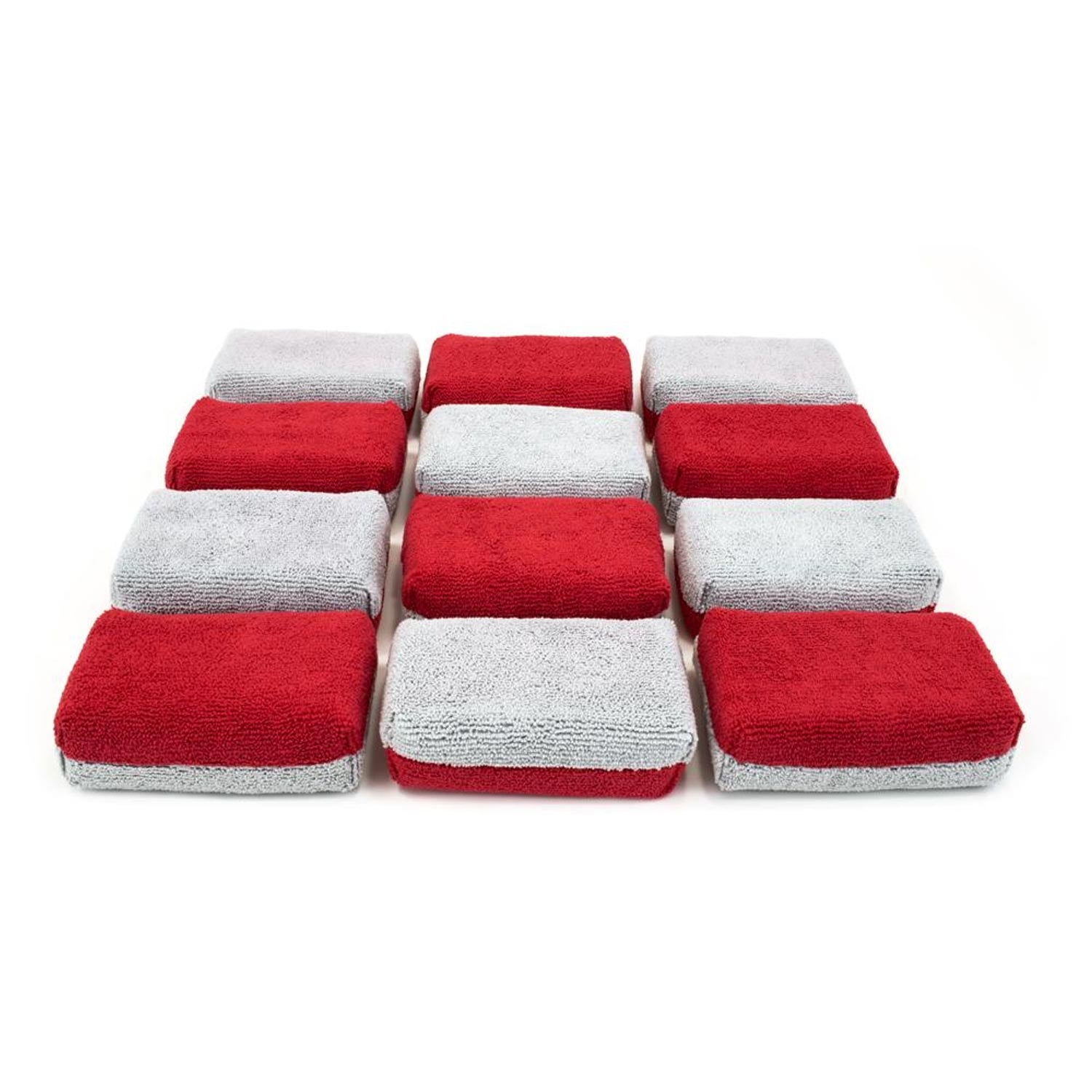 Set of red and gray microfiber applicators on a white background