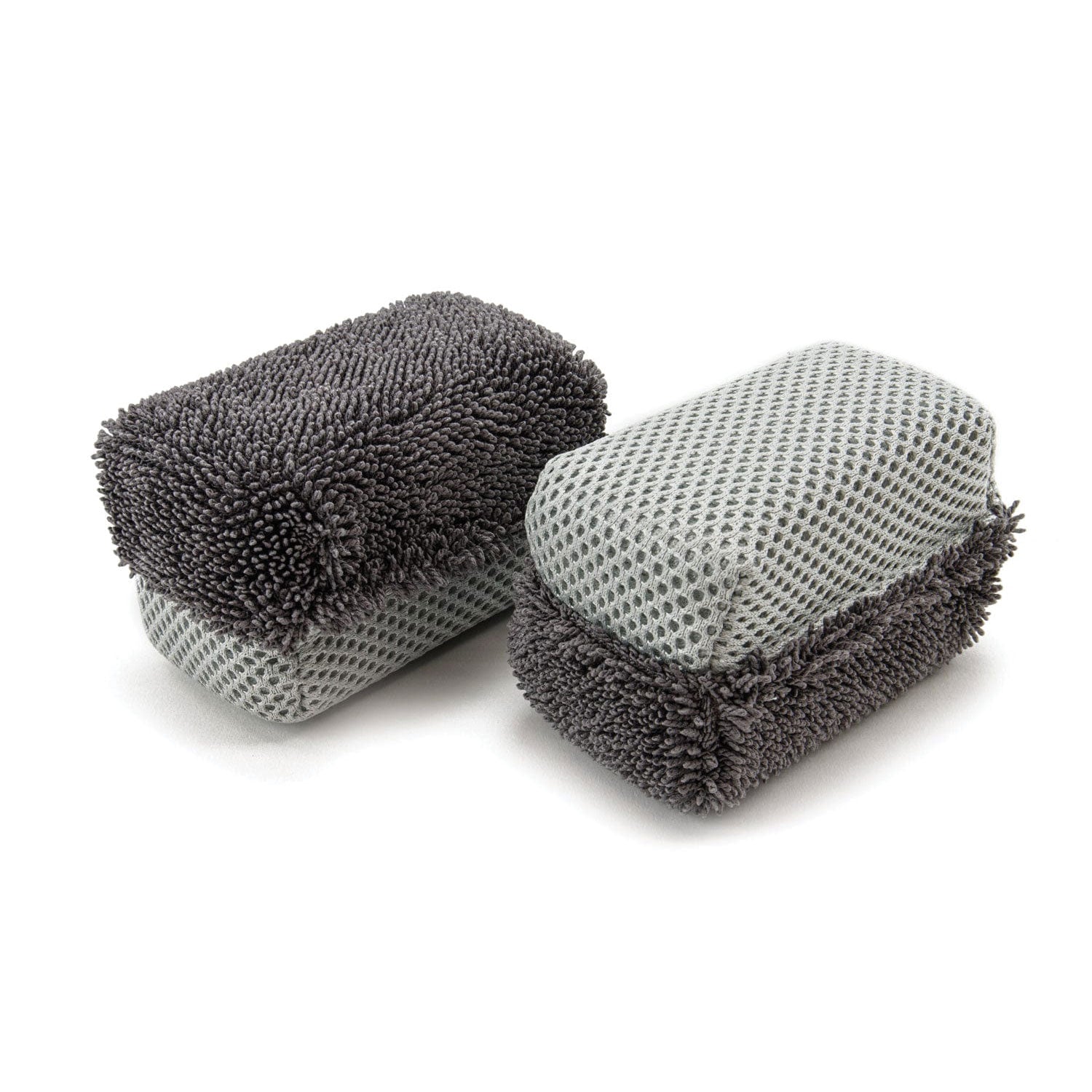 Two Grey Tire Dressing Applicators on White Background