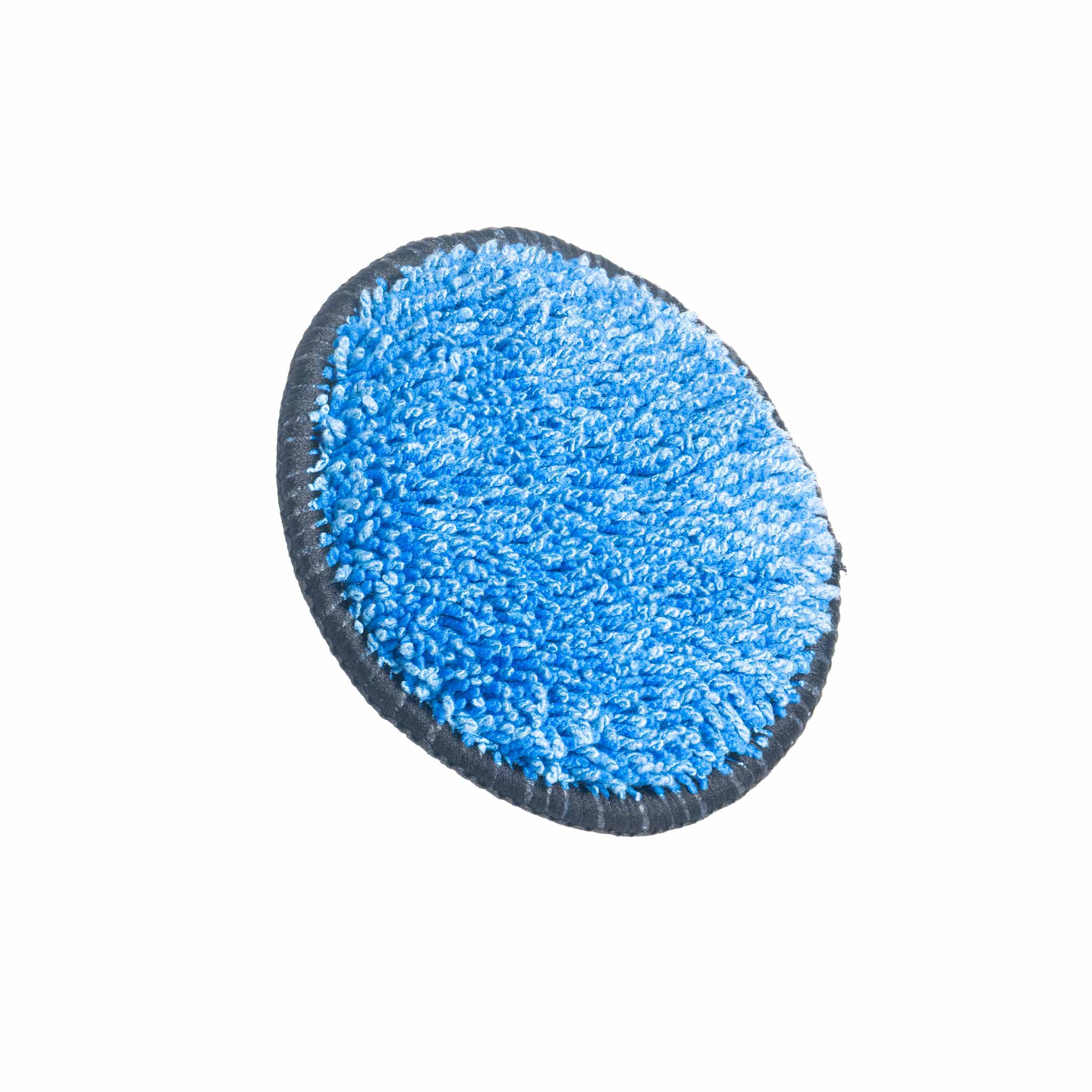 Blue circular cleaning pad on a white background