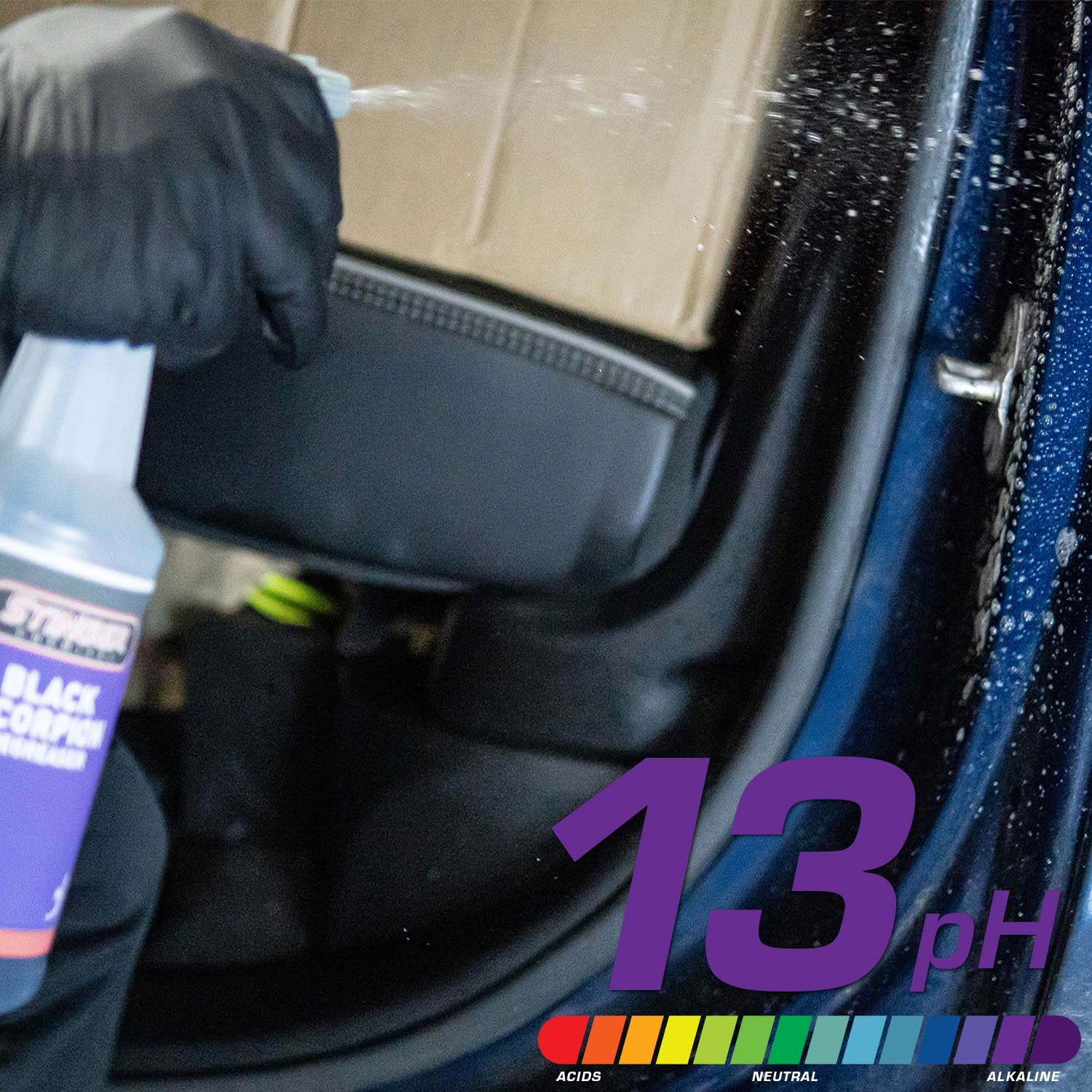 Person cleaning car interior with a black scorpion spray bottle labeled '13 pH' on a colorful pH scale.