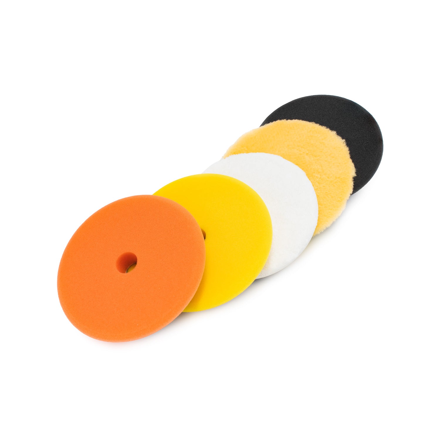 Set of five polishing pads in orange, yellow, black, white, and yellow on a white background.