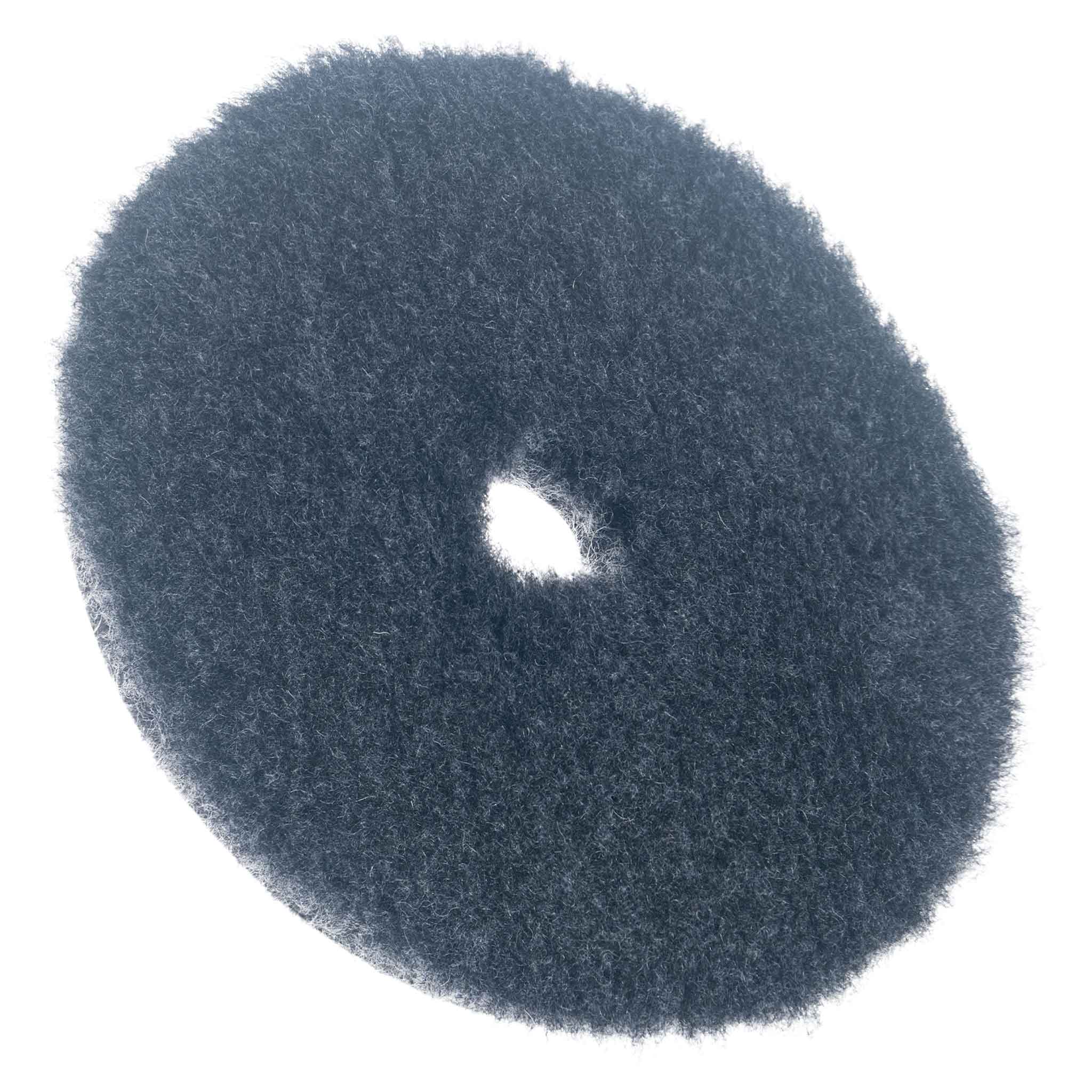 Round 6" grey wool pad on a white background