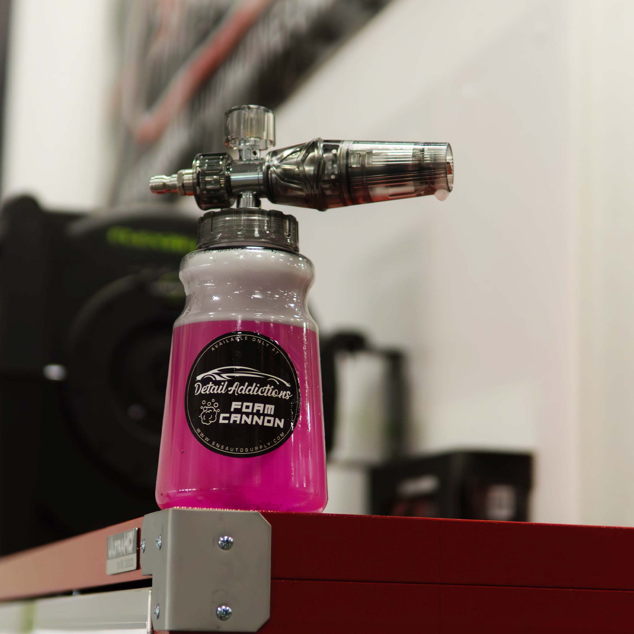 detail addictions foam cannon on a shop storage system