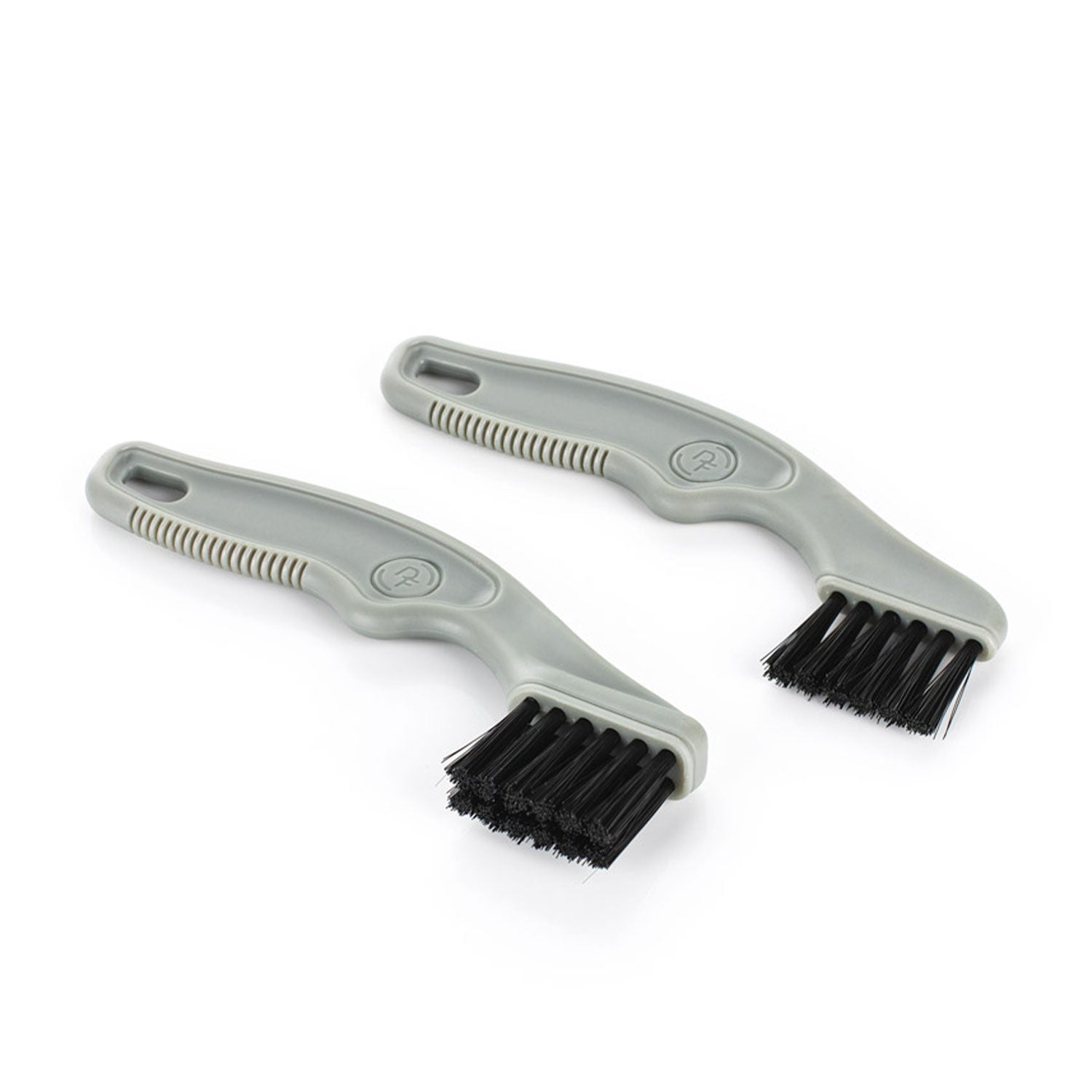 Two gray brushes with black bristles on a white background