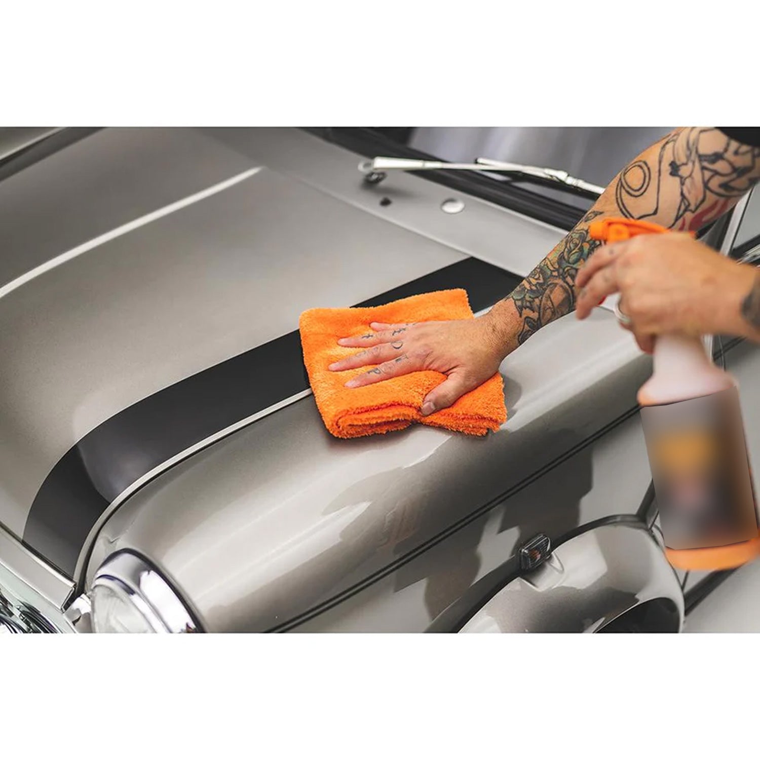 orange-towel-wiping car