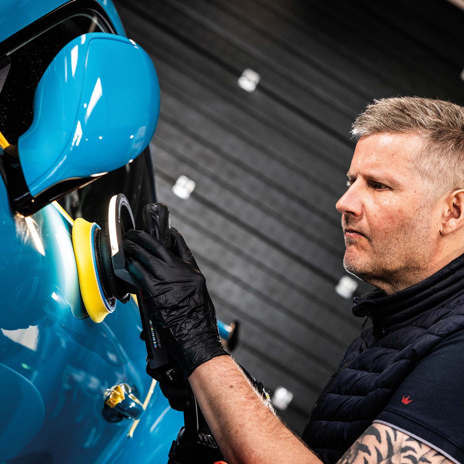 Starmatch detailing light used on a RUPES car polisher