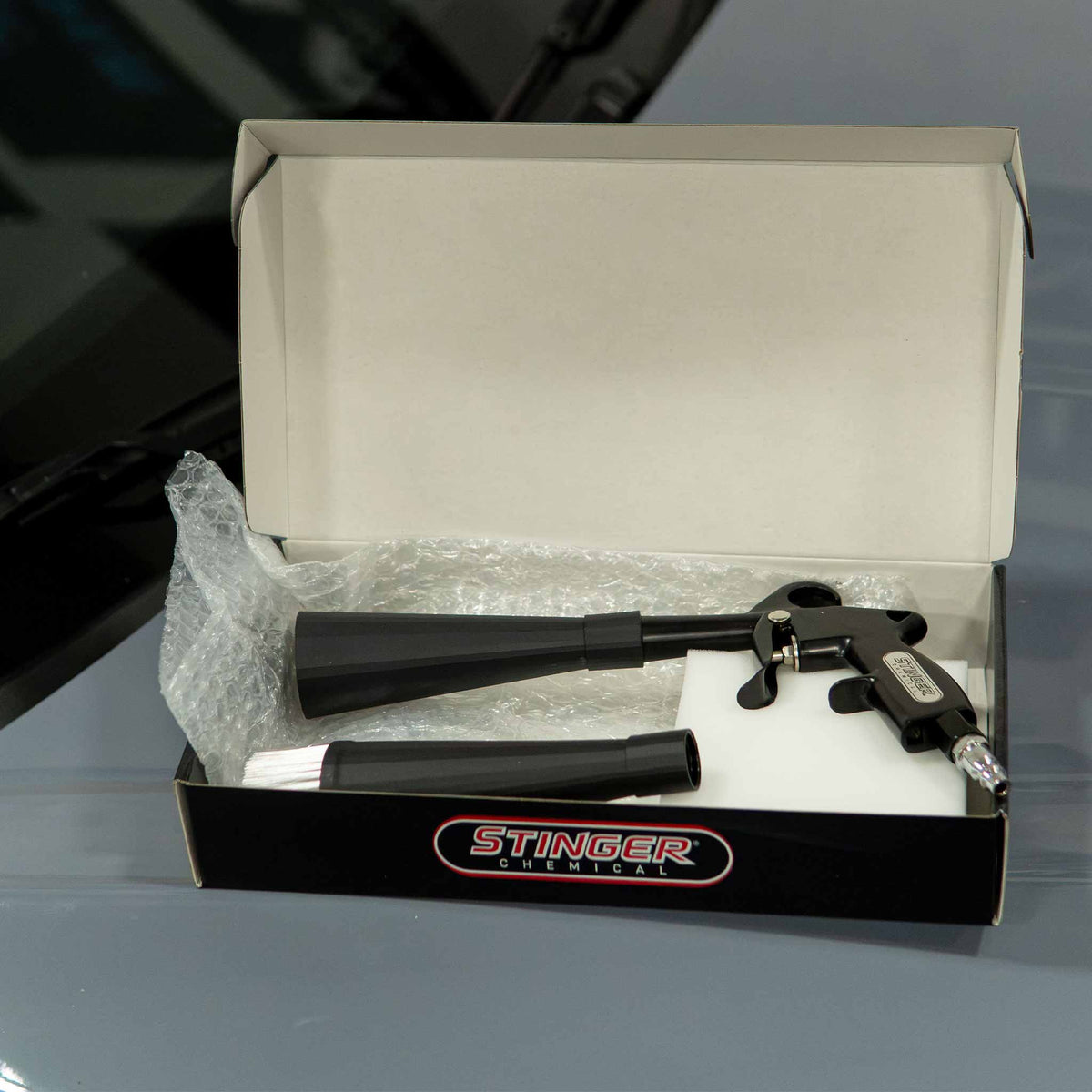 Stinger Twister Blow Gun ST-T-APBCG unboxed with cone nozzle and bristle attachment