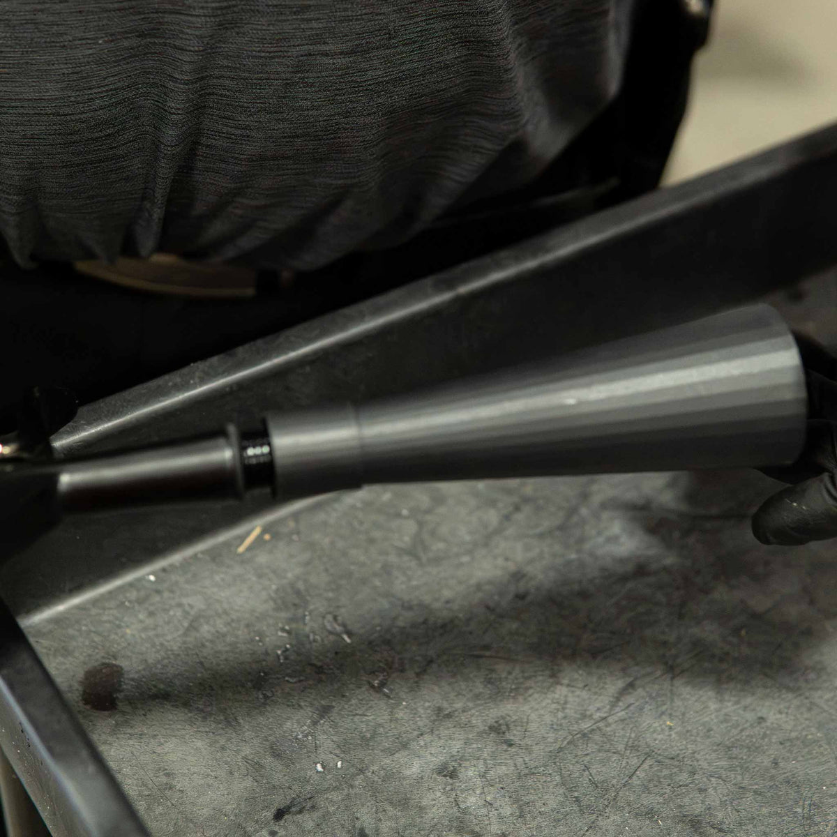 Stinger Twister long cone for the pistol grip blowout tool ST-T-APBCGC being screwed back on
