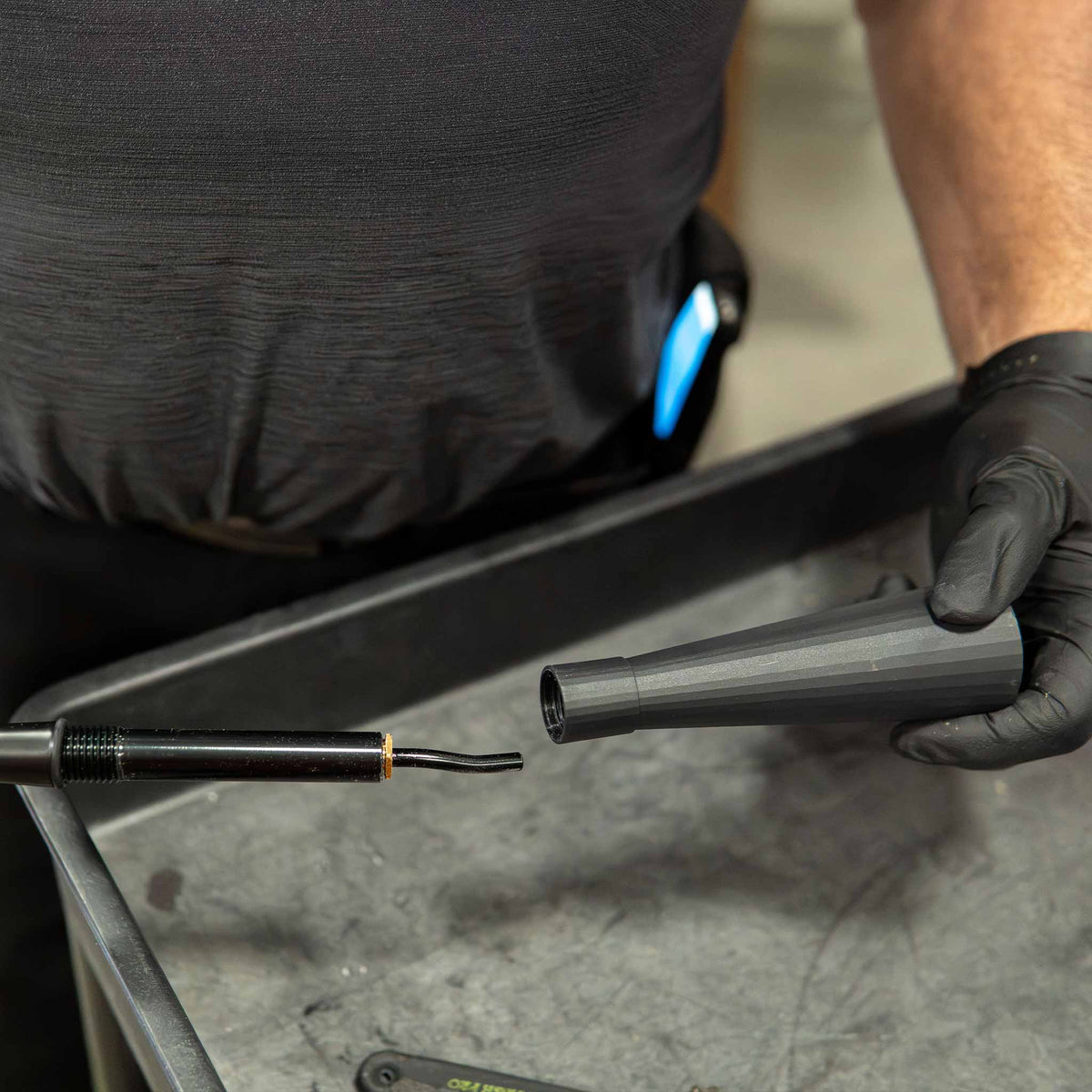 Stinger Twister long cone for the pistol grip blowout tool ST-T-APBCGC being removed