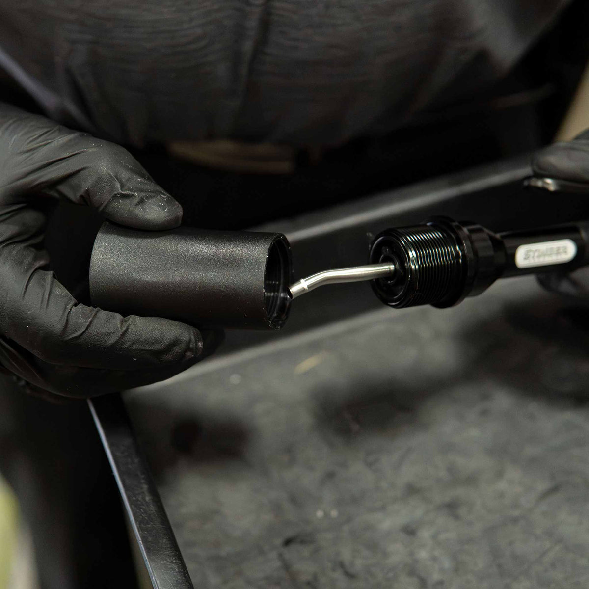 Stinger chemical twister rotation assembly removal from the twister mini tool
