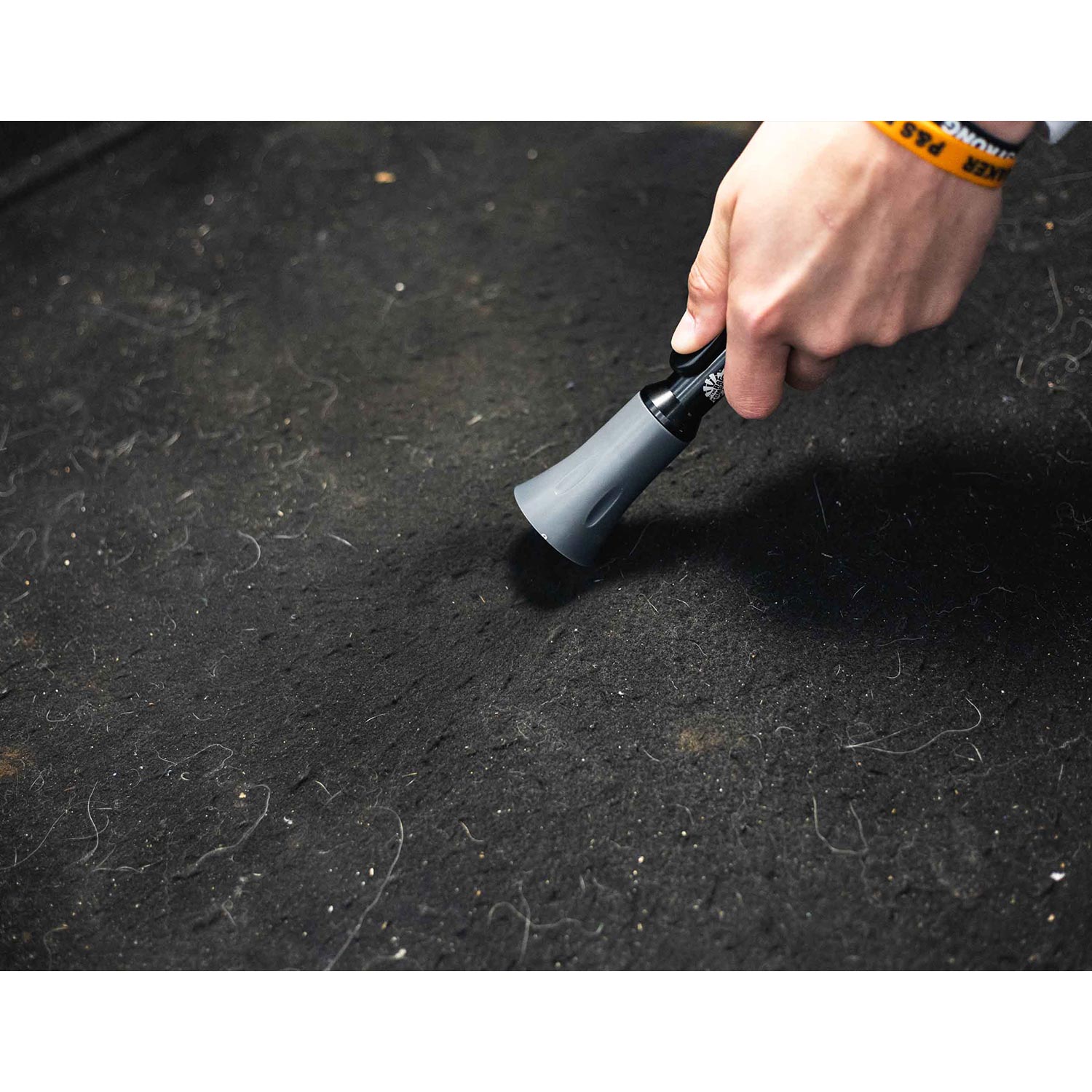 TRC Mini Blaster in action on a pet hair carpet