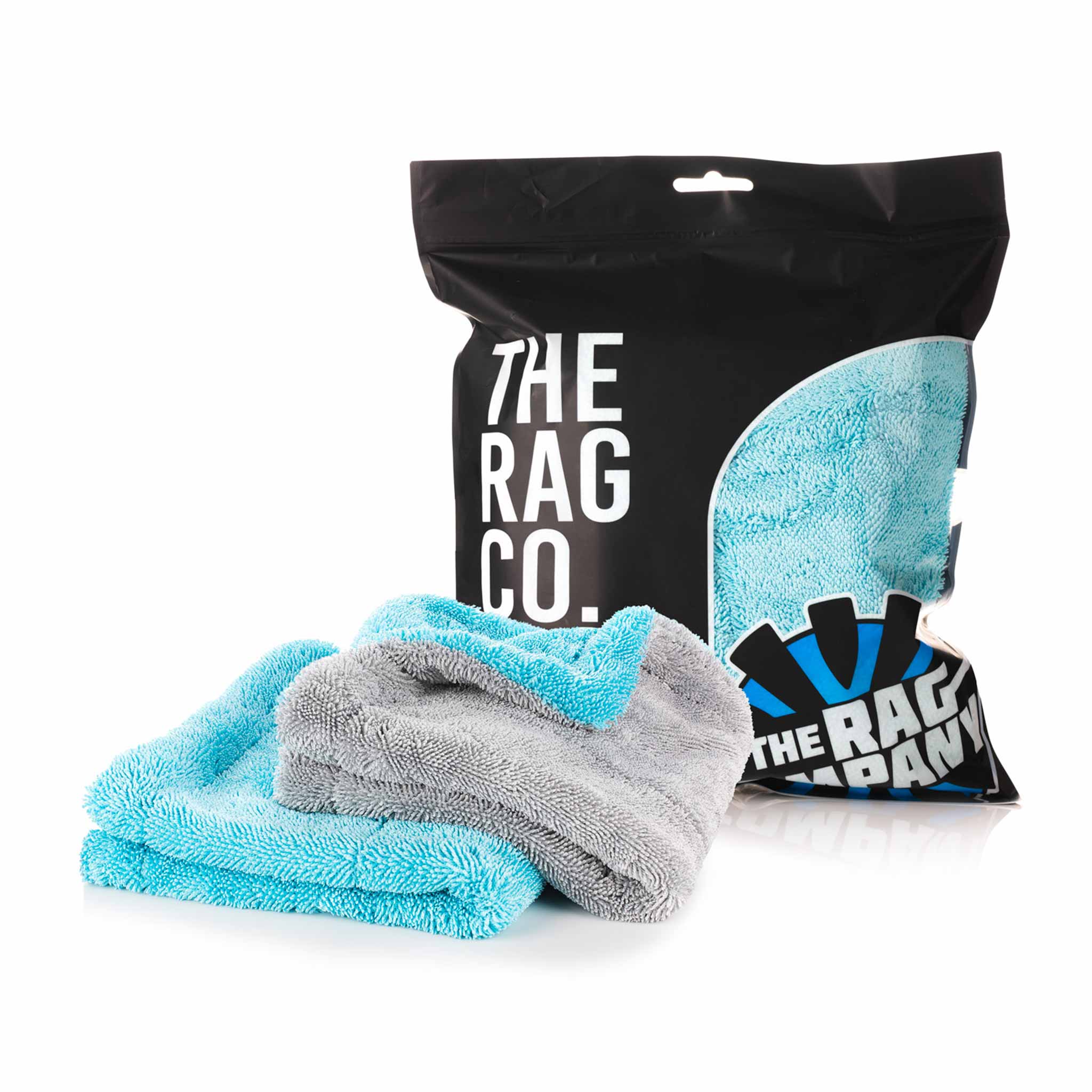Two microfiber cleaning towels, one light blue and one gray, displayed in front of their black packaging from The Rag Co.
