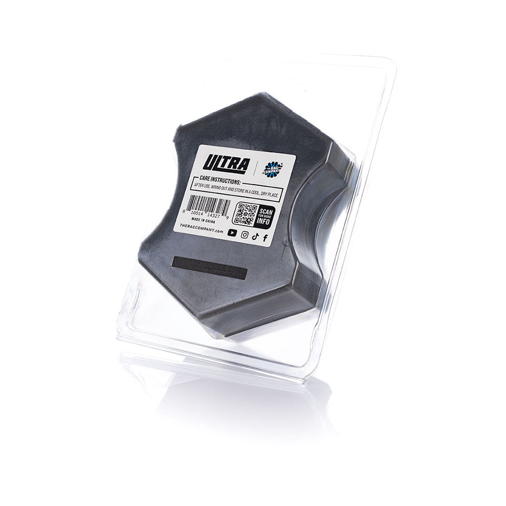 Hexagonal black object with Ultra label in clear packaging on a white background