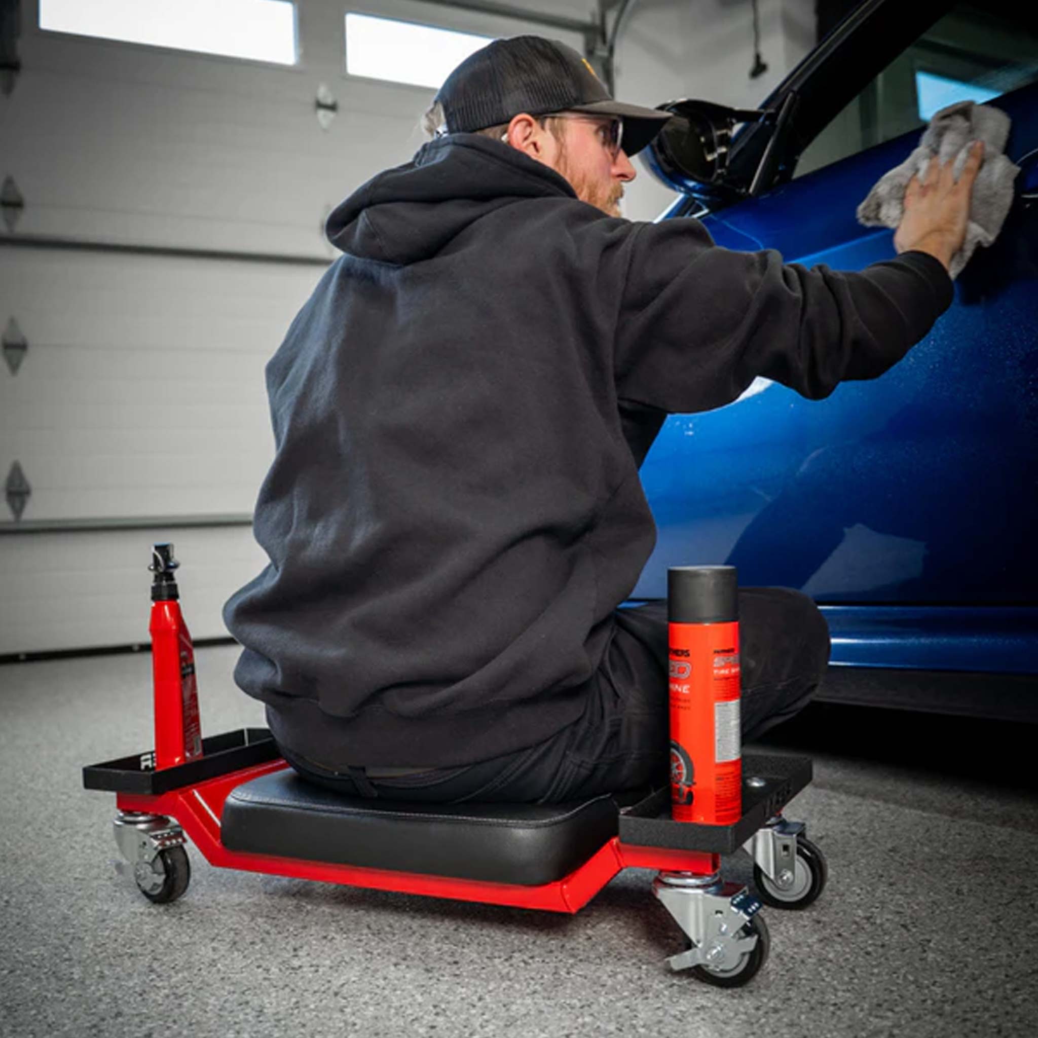vyper mini creeper use in a garage setting with blue car